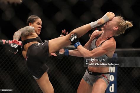 holm vs nunes|Amanda Nunes viciously head kicks Holly Holm to retain title.